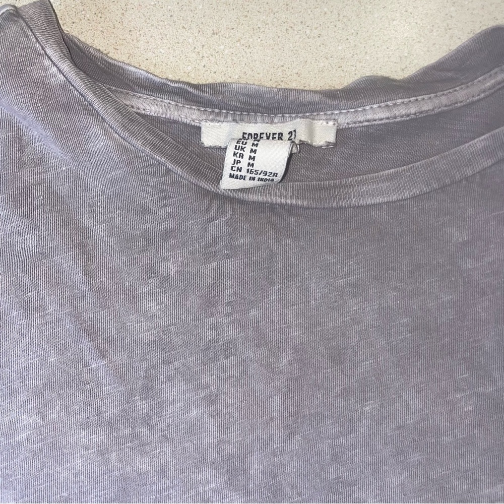 Faded top with holes